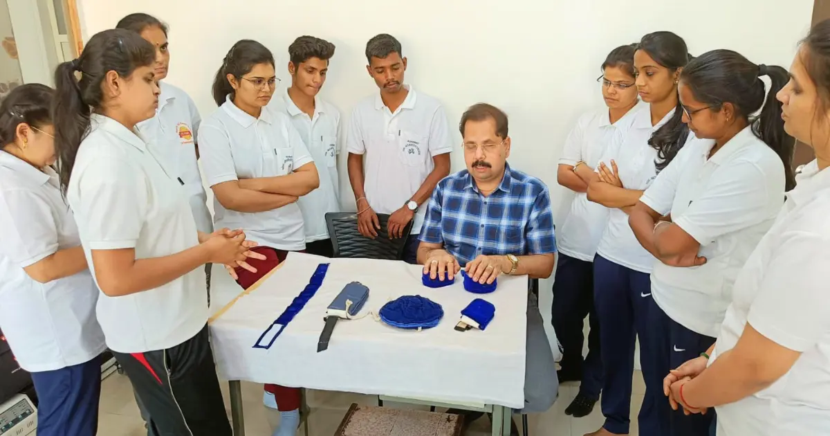 Students performing relaxation yoga techniques in class