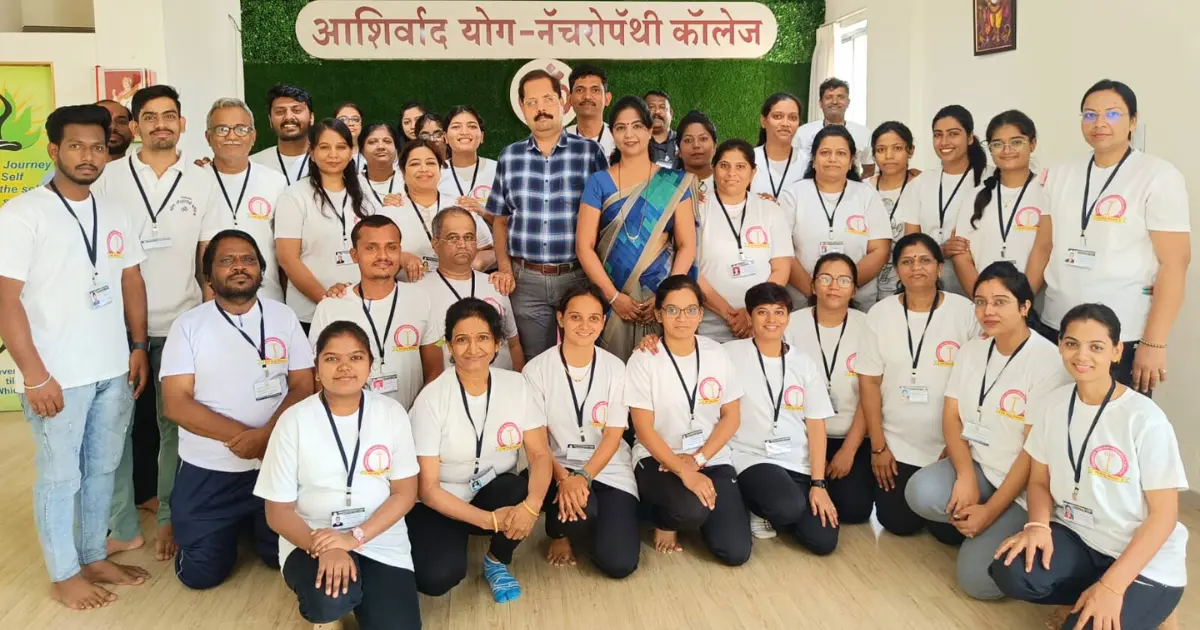 Yoga and naturopathy certification students in practical workshop