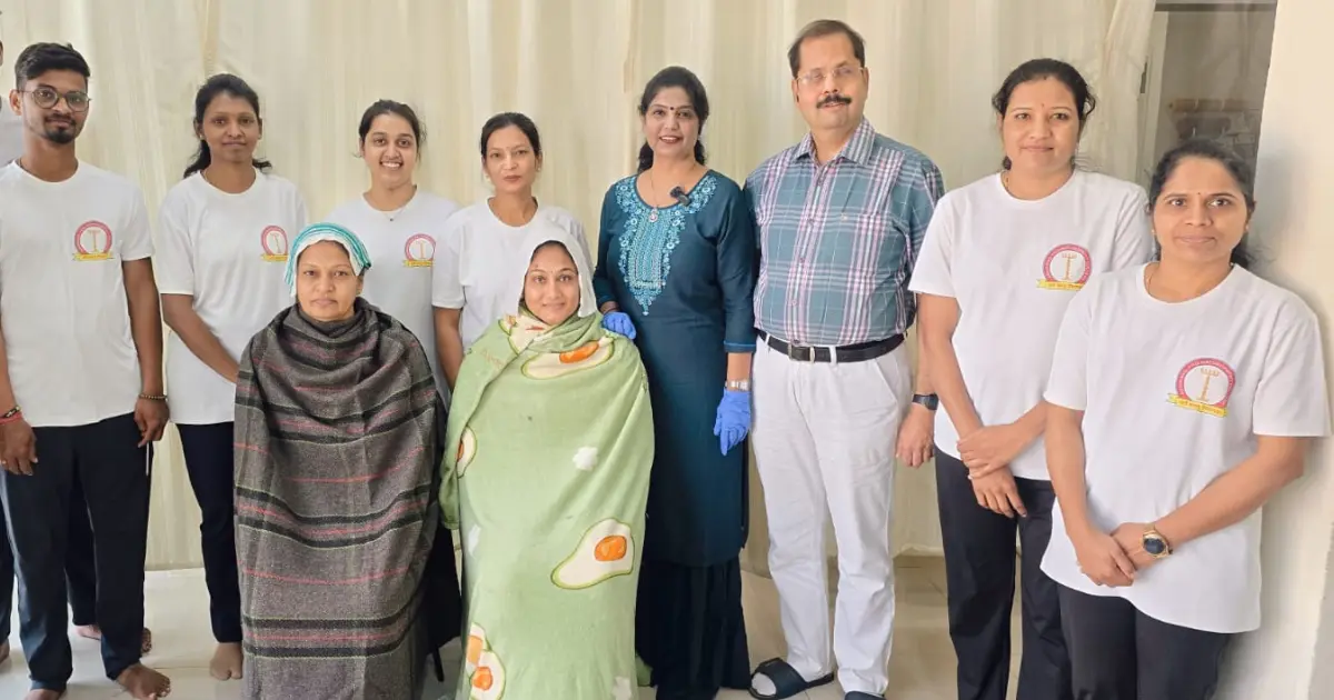 Yoga students learning pranayama techniques in classroom session
